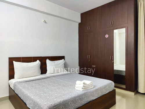 Bedroom one of KK Residency TrustedStay Service Apartment in Gachibowli Hyderabad